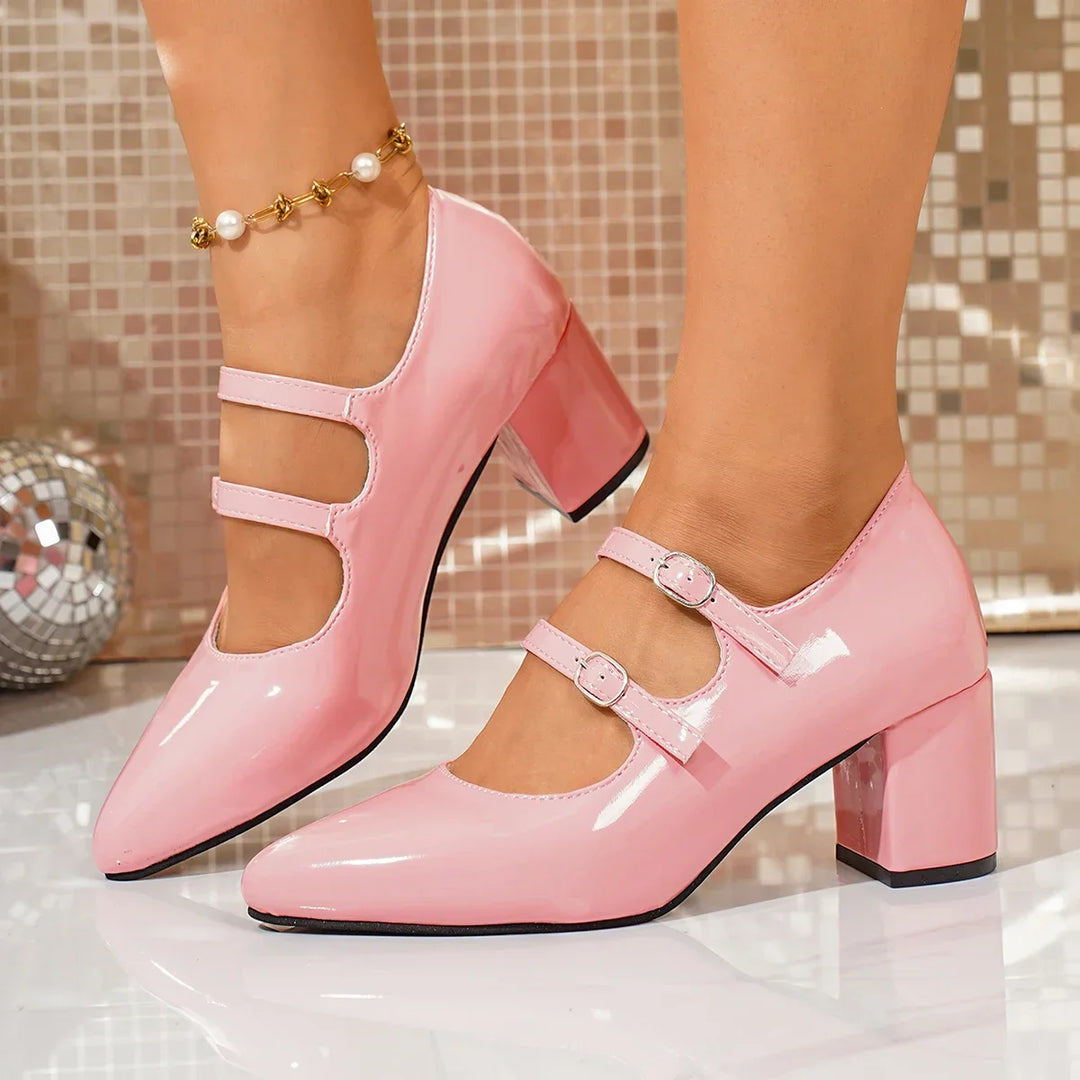 Stylish women's block heel pumps featuring dual decorative buckle accents