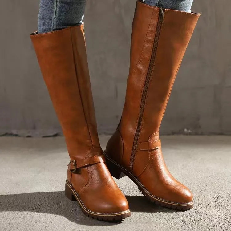 Close-up of the textured leather on women's orthopedic boots, highlighting quality and craftsmanship.