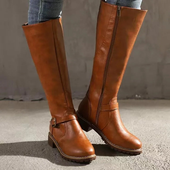 Close-up of the textured leather on women's orthopedic boots, highlighting quality and craftsmanship.