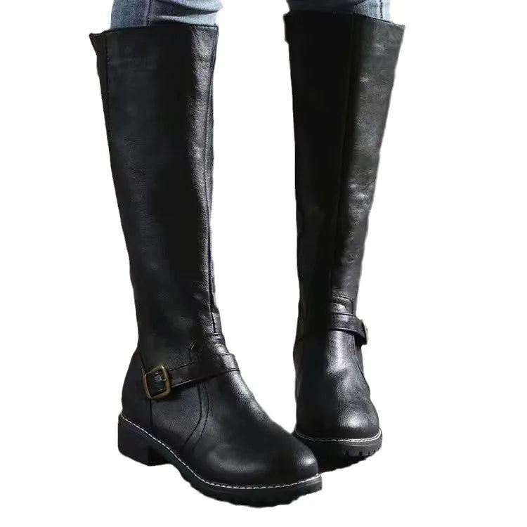Pair of women's comfortable orthopedic winter boots made from genuine leather with a low block heel.