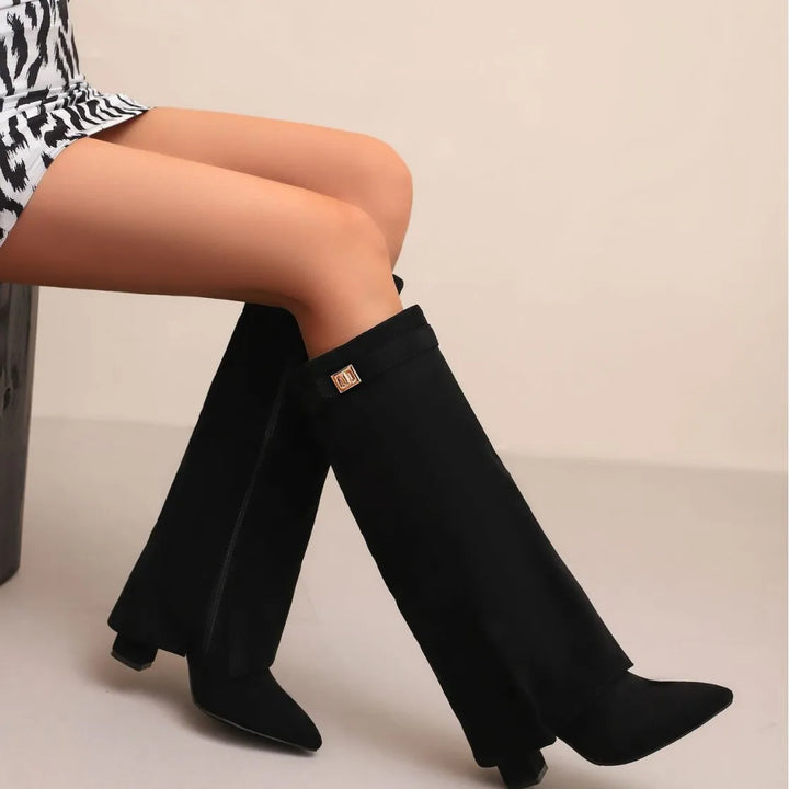 Elegant women's thigh-high leather boots with decorative buckle