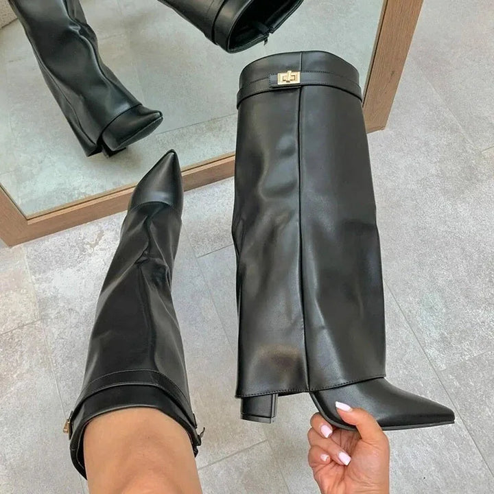 Side profile of women's fashion leather thigh-high boots with adjustable buckle