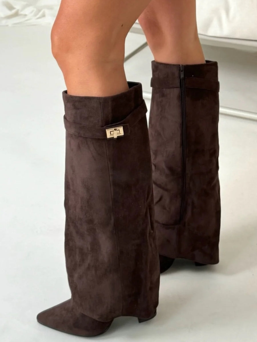 Women's premium leather thigh-high boots featuring standout buckle accents, for a bold statement.