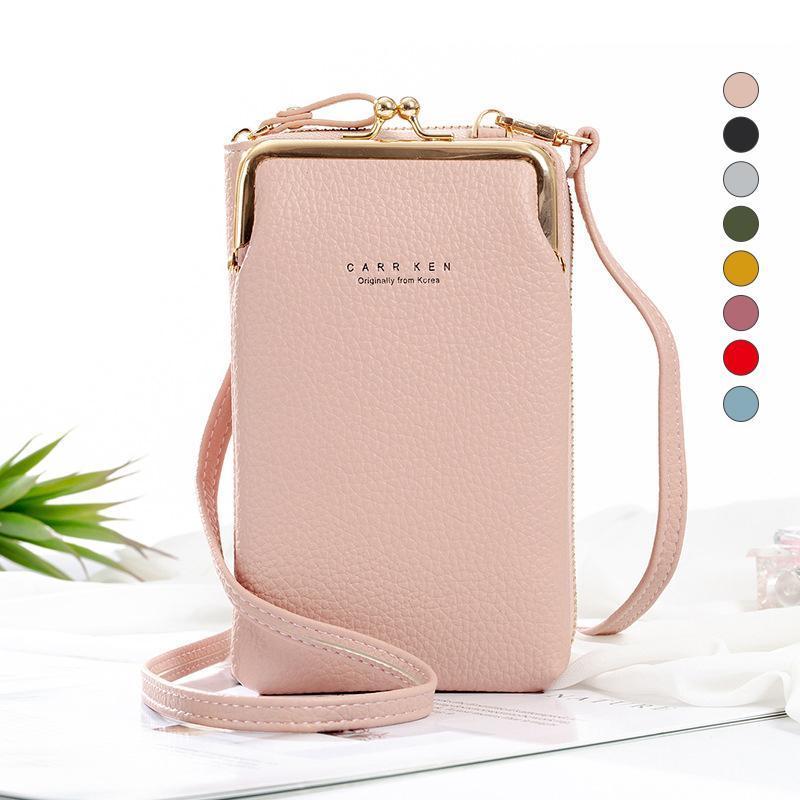 Women's black mini phone crossbody bag with adjustable strap, view of front flap closure & texture
