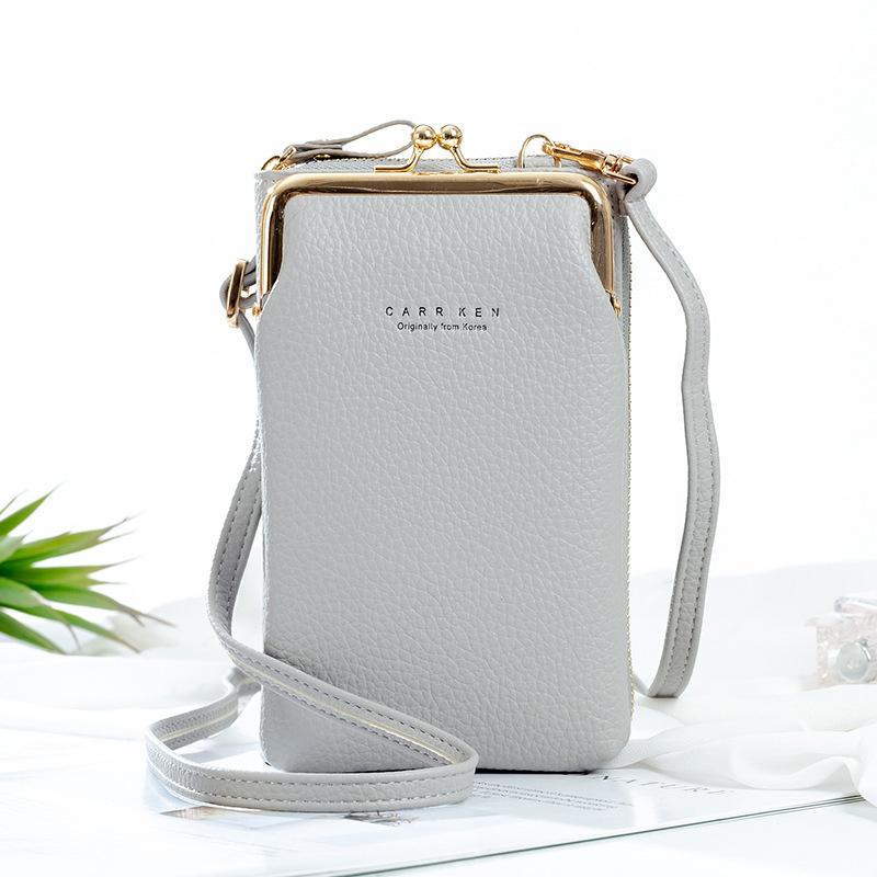 Textured PU leather detail of the women's mini phone travel bag, showing material quality