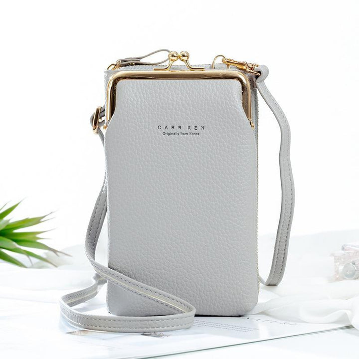 Textured PU leather detail of the women's mini phone travel bag, showing material quality