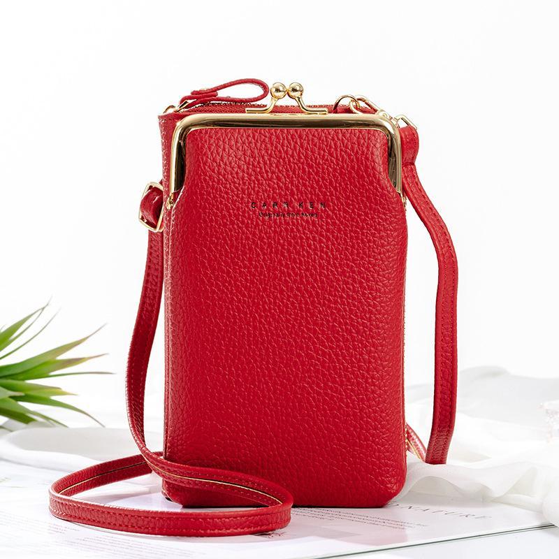 Model wearing the black women's phone crossbody bag, illustrating scale & how the adjustable strap sits