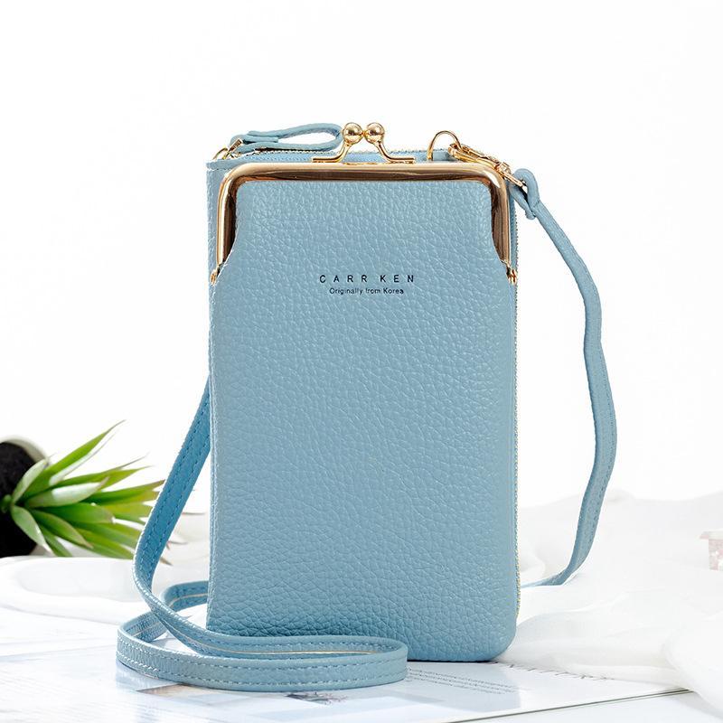 Close-up of the magnetic snap closure on the women's mini phone bag, ensuring security