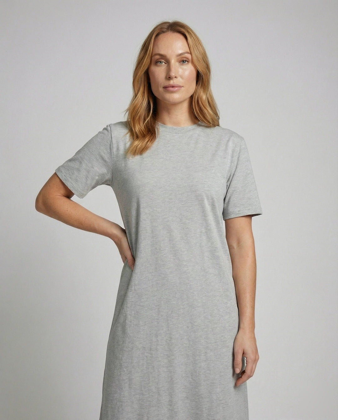 Casual women's oversized maxi dress, mock neck, side split. Perfect for comfortable, minimalist everyday wear.