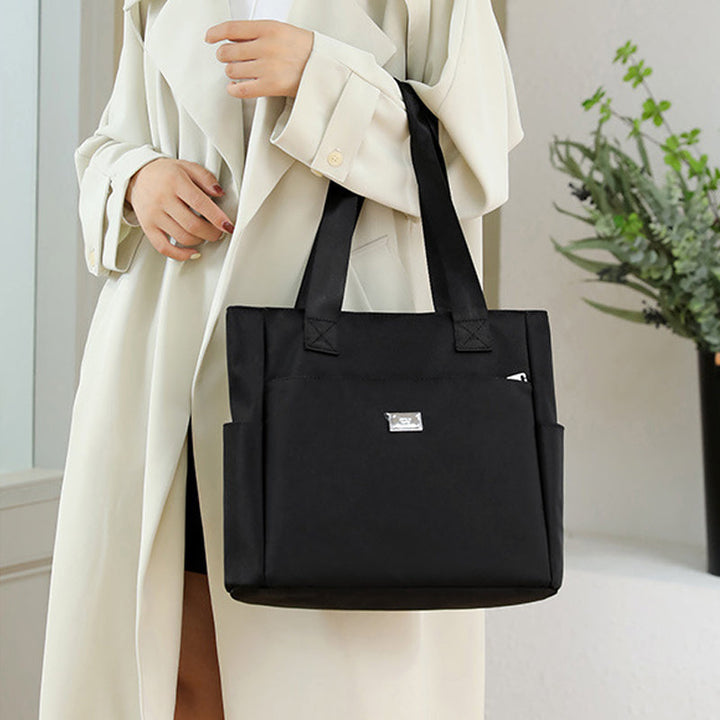 Women's waterproof crossbody bag made of durable nylon, ideal for work and everyday wear