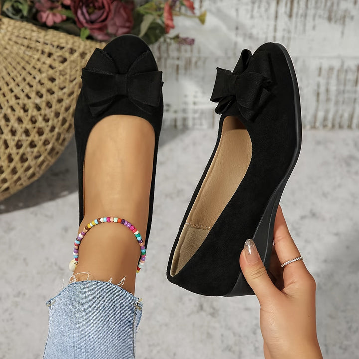Gray women's orthopedic comfort flats, slip-on for versatile wear.