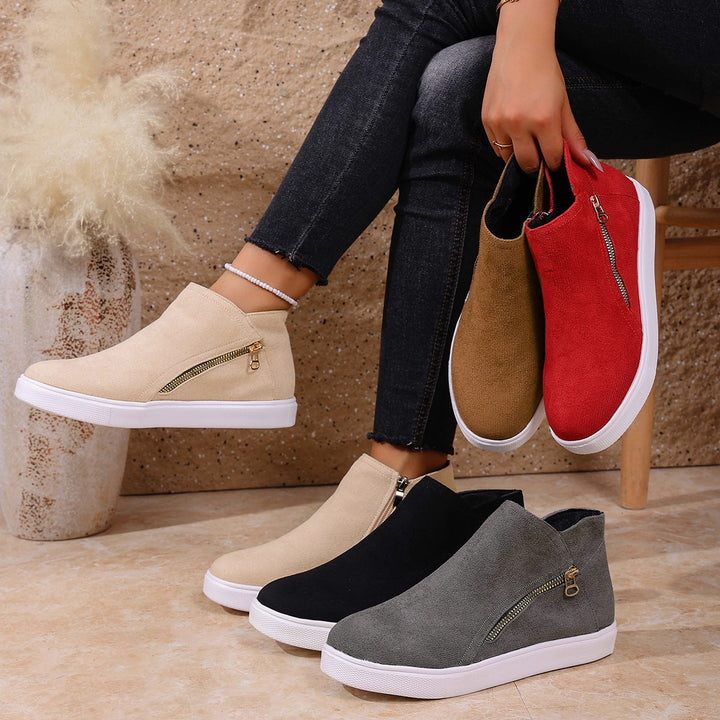 Side view of grey women's zip-up comfort sneakers, designed for shock absorbing walking support.