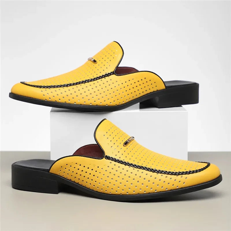 Women's mules: sophisticated perforated black leather slip-ons for a chic look
