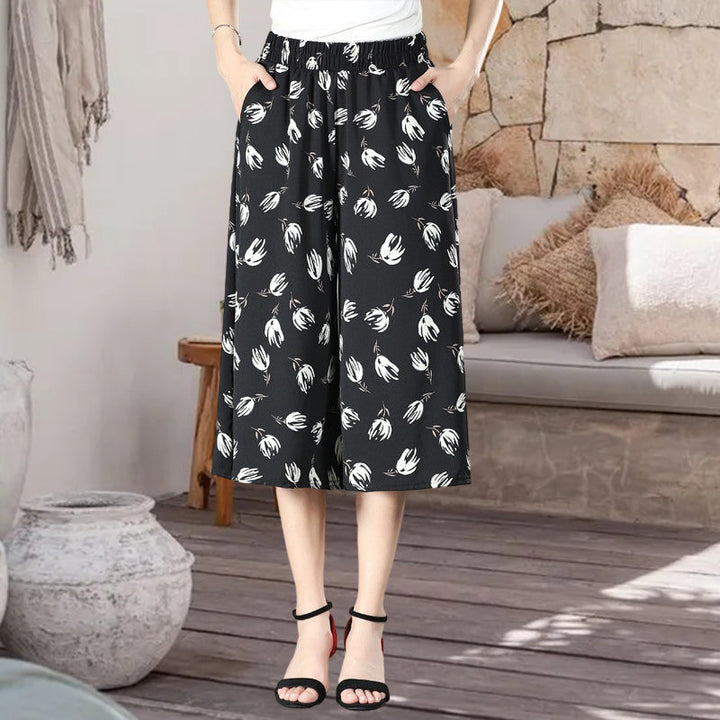 Casual black chiffon wide leg culottes, high waist, pleated detail, excellent for everyday wear.