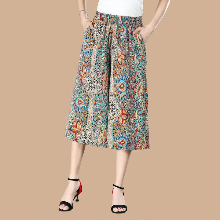 Floral print women's wide leg culottes, high waisted, pleated, made of comfortable chiffon.