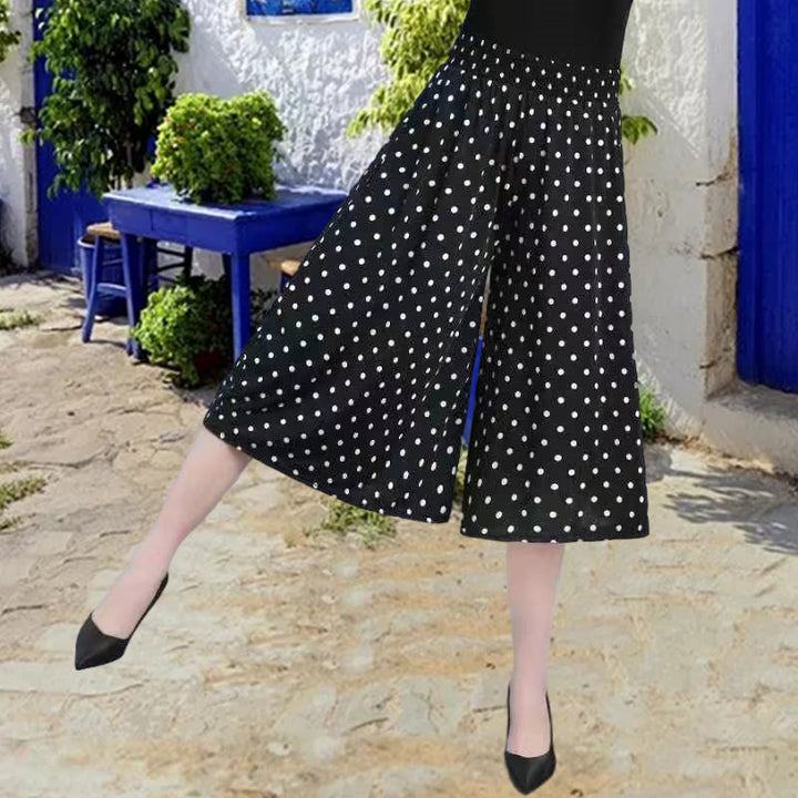 Summer casual women's chiffon culottes, pleated wide leg design with a high elastic waist.