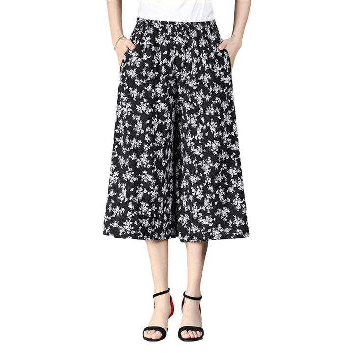 Women's high waist culottes, pleated wide leg, floral pattern, soft chiffon, perfect for warm weather.