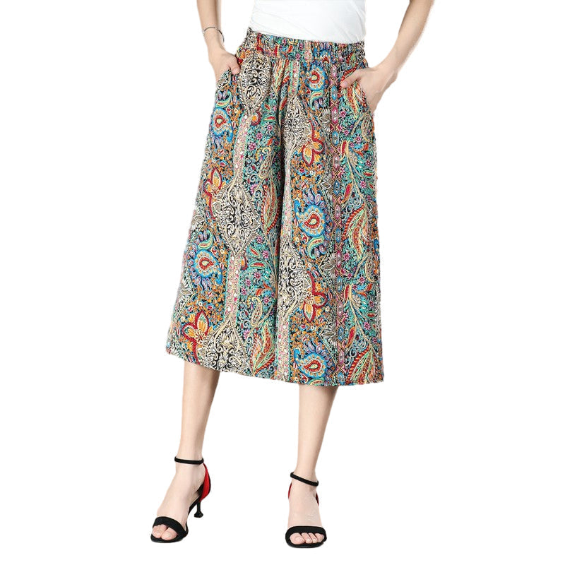 Elegant black pleated wide leg culottes, high elastic waistband, essential women's summer pants.