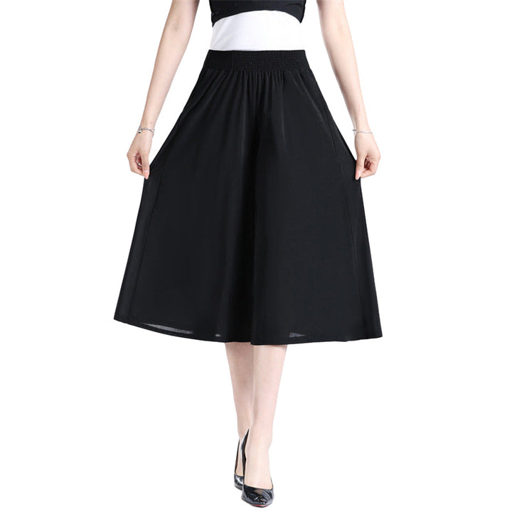 Fashionable women's wide leg pleated pants, high elastic waist in a comfortable polyester blend.