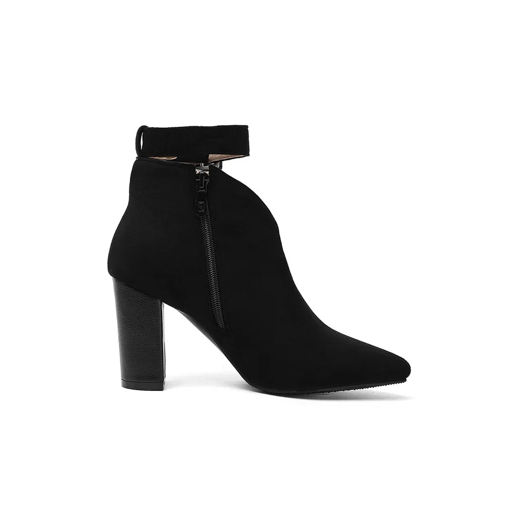 Black women's ankle boots, pointed toe, with chic buckle accents and easy side zip access