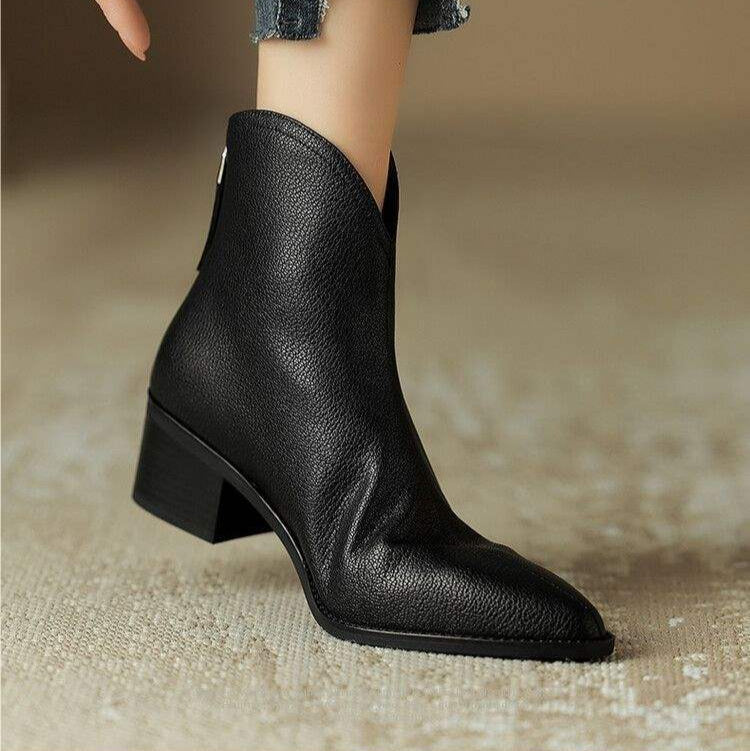 Versatile women's pointed toe ankle boots, low heel, slip-on style, suitable for many outfits.