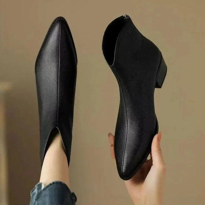 Chic women's pointed toe ankle boots, low heel, slip-on, great for fall & winter fashion.