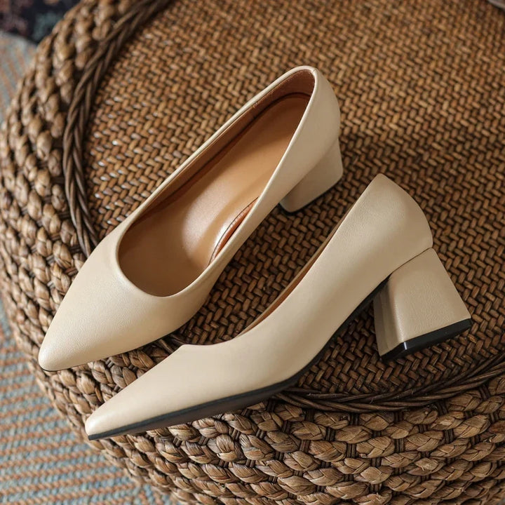 Sleek women's pointed toe block heels. Classic non-slip pumps, suitable for office professionals and evening events.