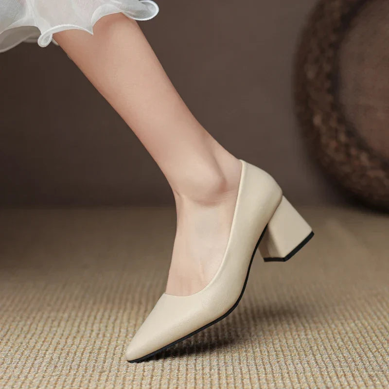 Women's pointed toe block heel pumps. Engineered with a non-slip sole for safe and comfortable office and event wear.