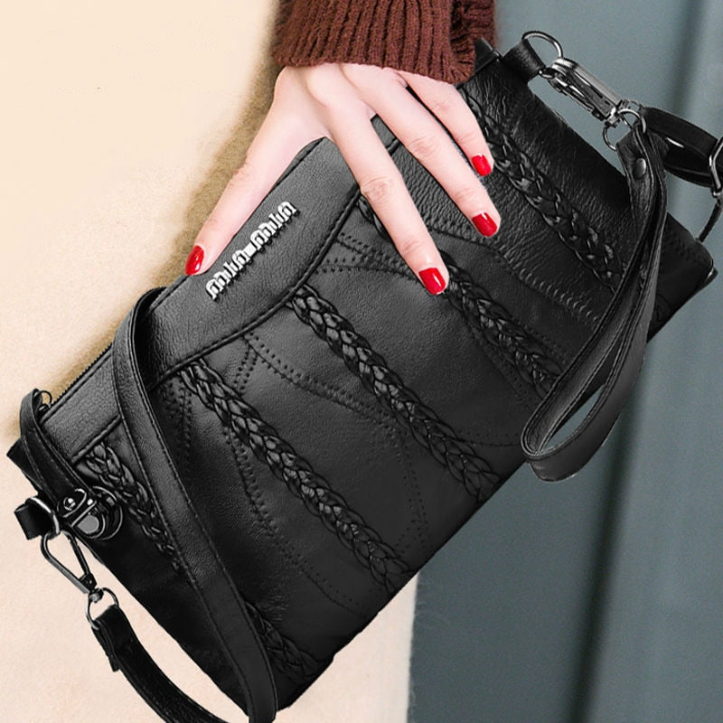 Versatile women's PU leather crossbody clutch, perfect for evening or daily use, featuring organized compartments.