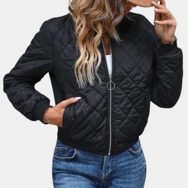 Women's black quilted bomber jacket with zip-up front, perfect for casual outerwear