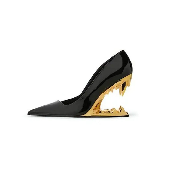 High-fashion black women's pumps featuring a sculptural fang heel for a unique, statement appeal.
