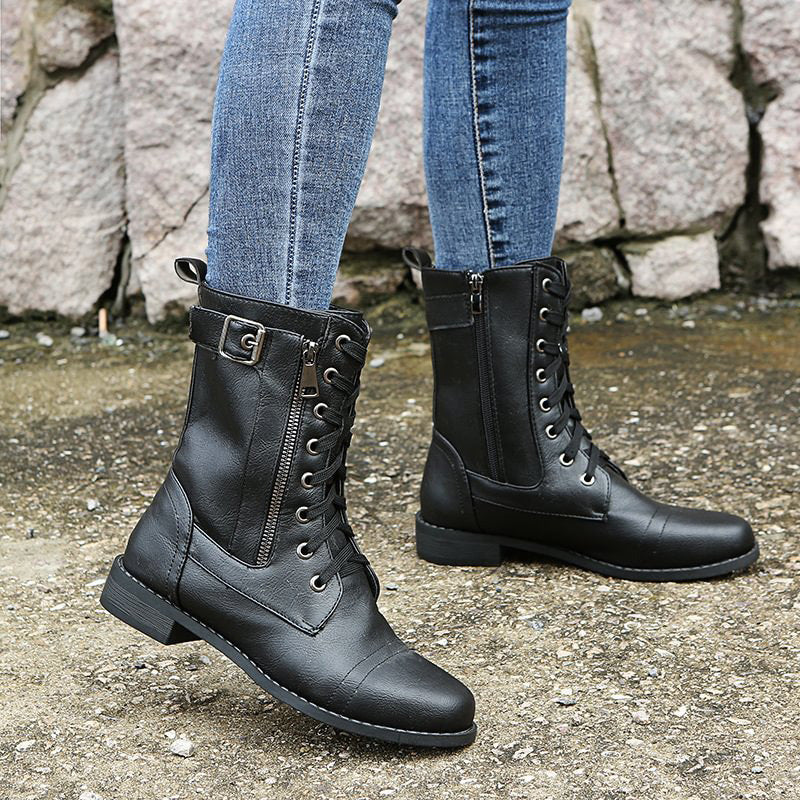 Rugged women's combat boots, featuring a convenient side-zip for easy wear