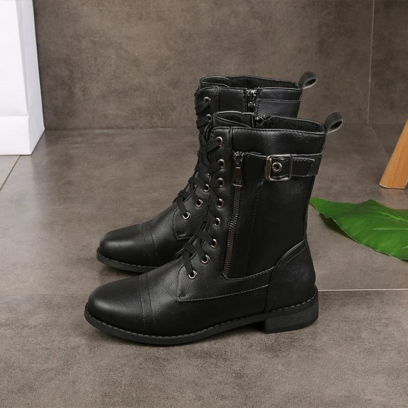 Women's combat boots display, highlighting the practical side-zip feature