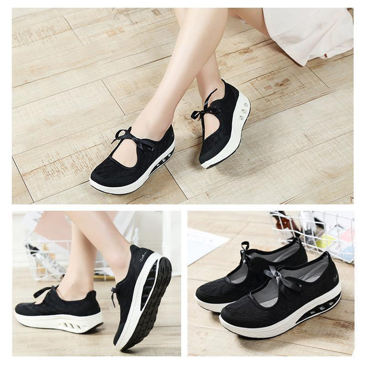 Women's light grey slip-on platform wedge sneakers, showcasing the slip-on elastic design
