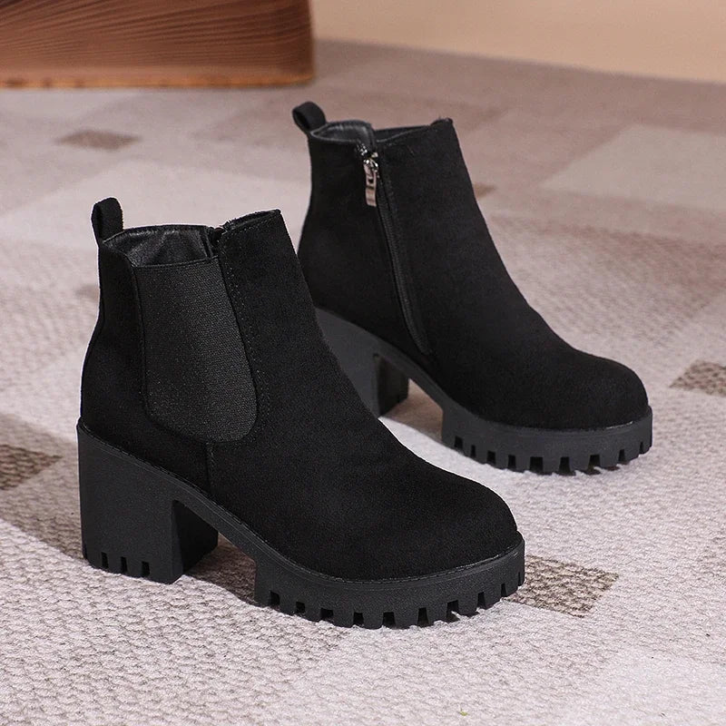 Side view of women's comfortable khaki suede ankle boots with a fashionable block heel design