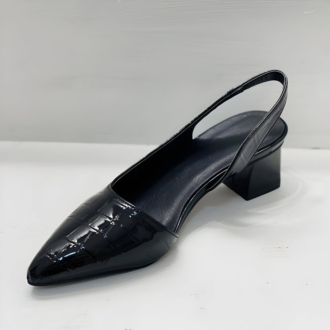 Comfortable women's dress loafers, with supportive heels in a versatile black for stylish footwear.