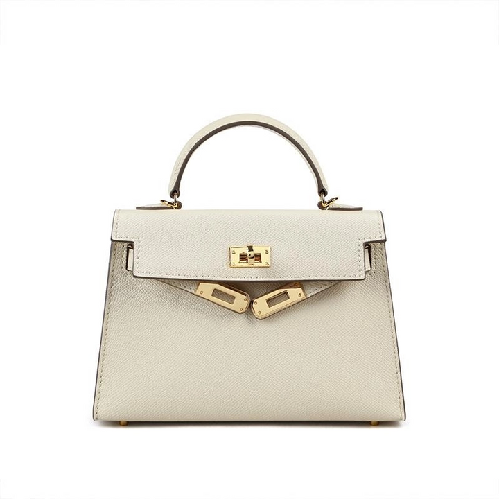 Fashionable women's crossbody shoulder bag. Ideal for everyday use with top handle & secure turn lock. Versatile handbag.