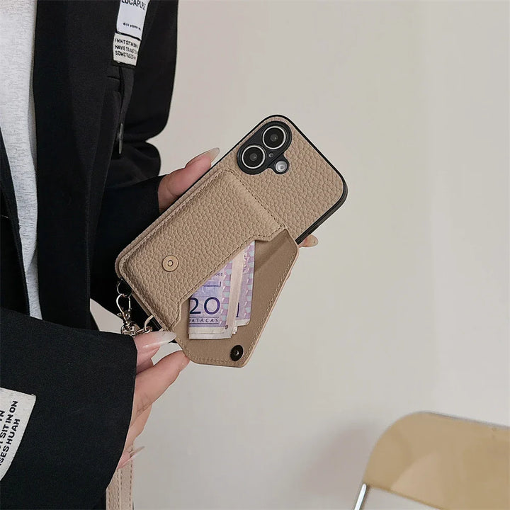 Detailed shot of card slots inside a women's vegan leather lanyard wallet phone case, practical storage