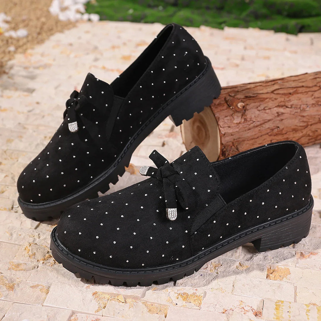 Elegant women's slip-on footwear: velvet platform loafers providing orthopedic arch support