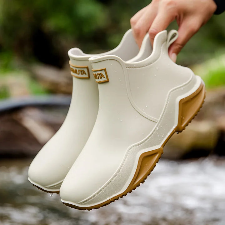 Women's outdoor waterproof slip-on ankle rain boots, designed for practical and chic weather protection.