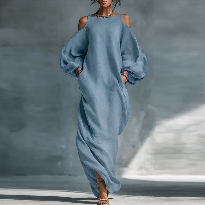 Women's bohemian cold shoulder maxi dress with long sleeves, flowy design perfect for summer casual elegance.