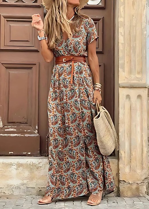Bohemian women's short sleeve maxi dress, featuring a beautiful floral pattern, V-neck, and a stylish side split for summer.