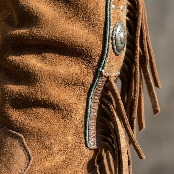 Fashionable women's mid-calf Western boots, elegant fringe, pointed toe, and sturdy block heel for boho style.