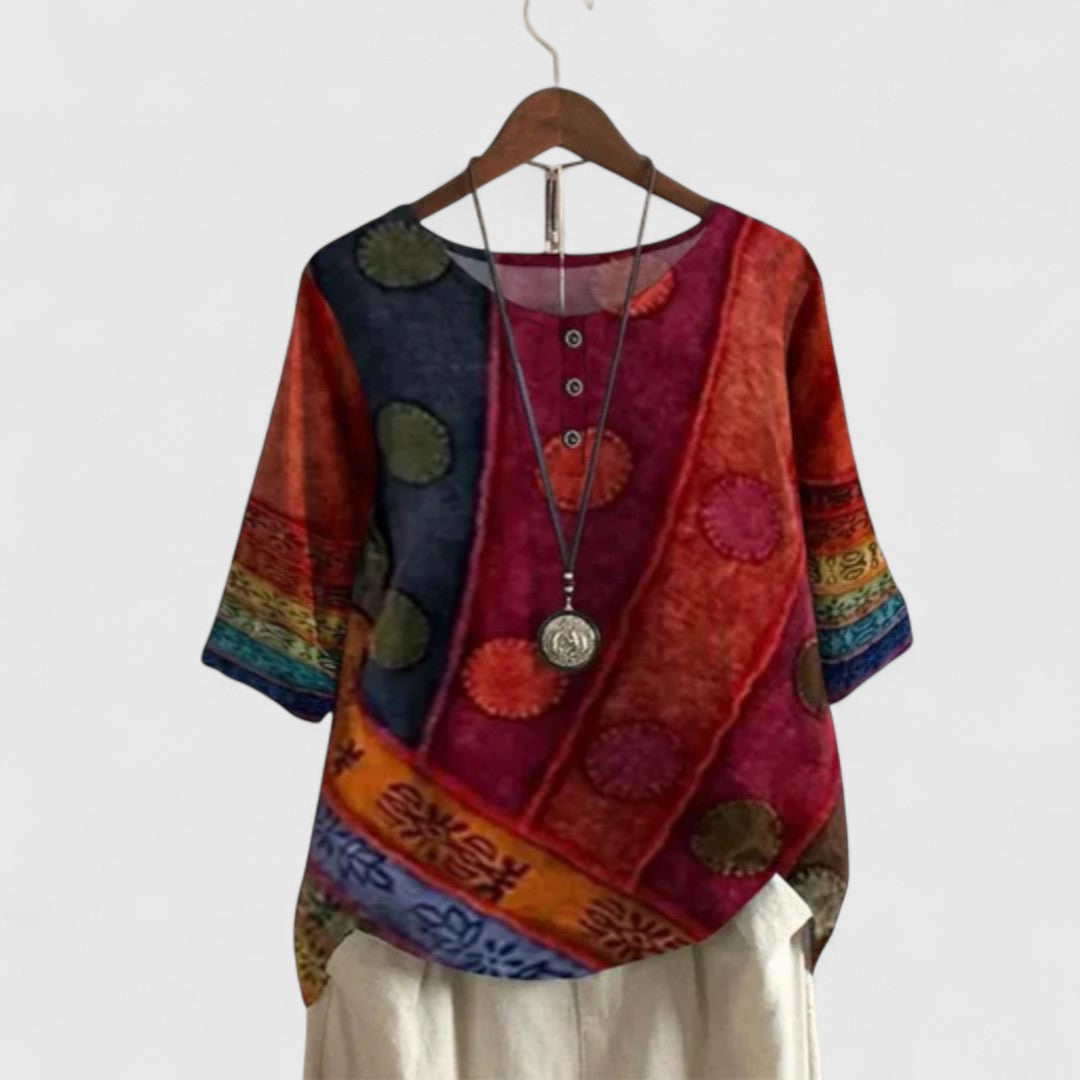 Women's bohemian patchwork short-sleeve top, stylish & comfortable for everyday wear. Flowy casual printed top.