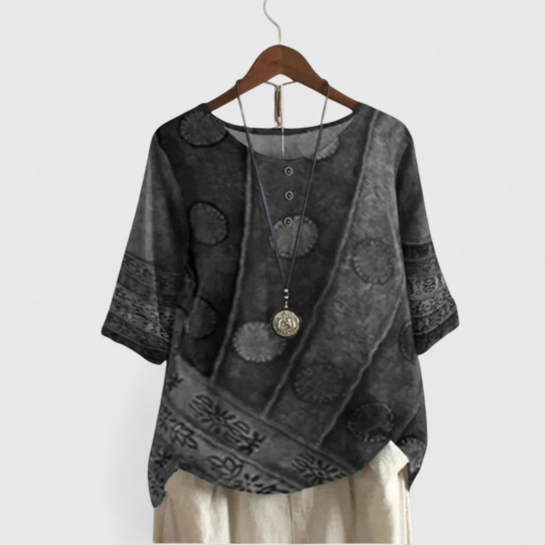 Comfortable women's bohemian patchwork top, ideal for travel wear. Casual short sleeve printed design.