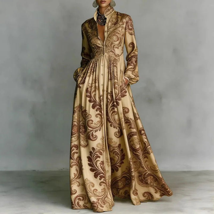 Printed women's maxi dress with long sleeves, stand collar, and button front, ideal for bohemian spring attire.