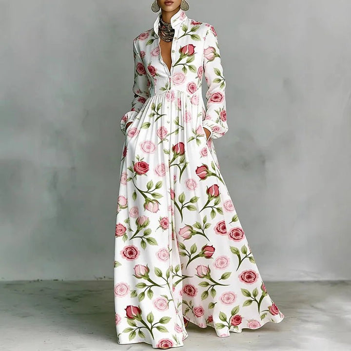 Bohemian long sleeve maxi dress with a beautiful print, stand collar, and button front for women's spring fashion.
