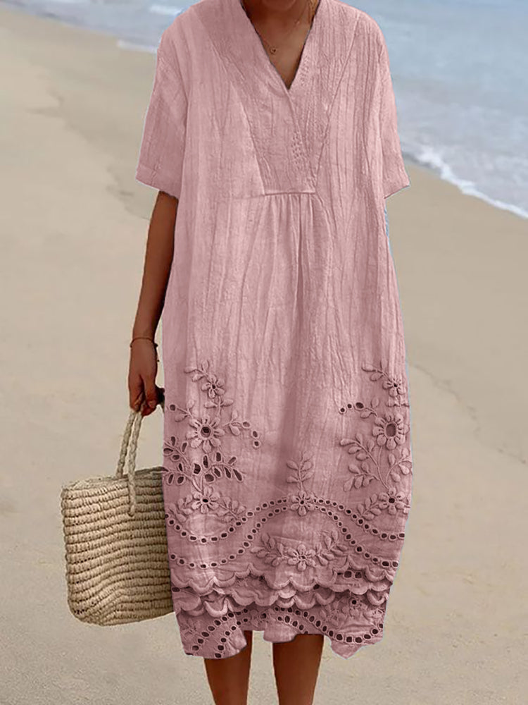 Chic women's bohemian midi dress with relaxed fit. Versatile summer flowing dress for casual outings or vacations.