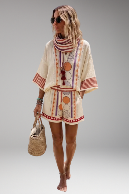 Boho two-piece set for women: embroidered V-neck top and casual shorts. Ideal summer or vacation outfit.