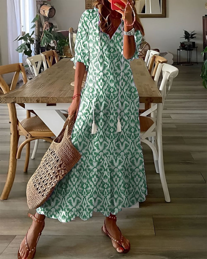 Flowy women's boho floral maxi dress, ideal for summer parties, beach, or casual wear. Long & elegant.